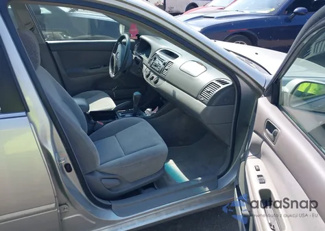 2003 Toyota Camry Le z USA, uszkodzony, nr VIN 4T1BE32K53U136384